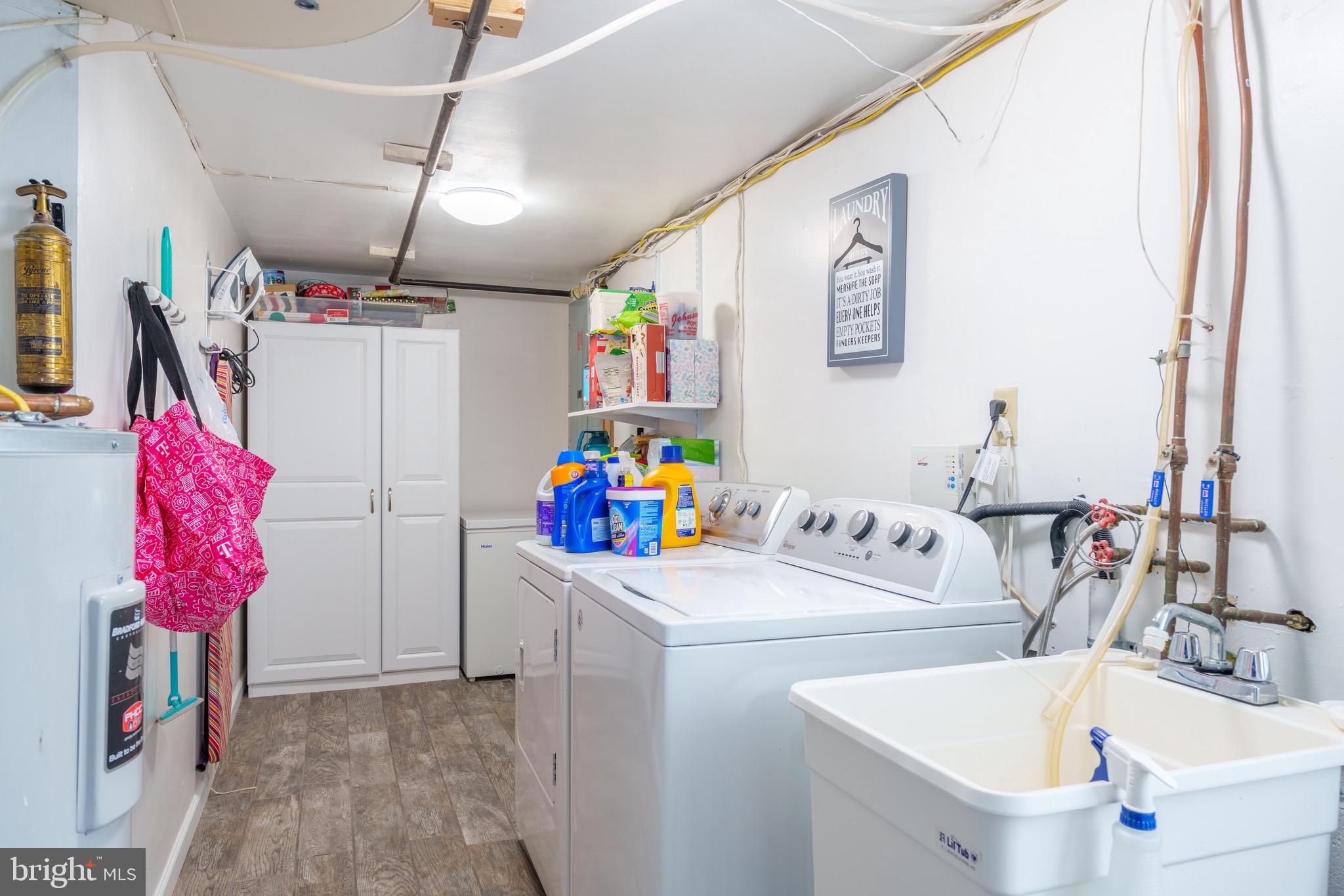 1003 Piper Road Wilmington, DE 19803 - Photo 21 of 40 a bathroom with a sink mirror vanity and window