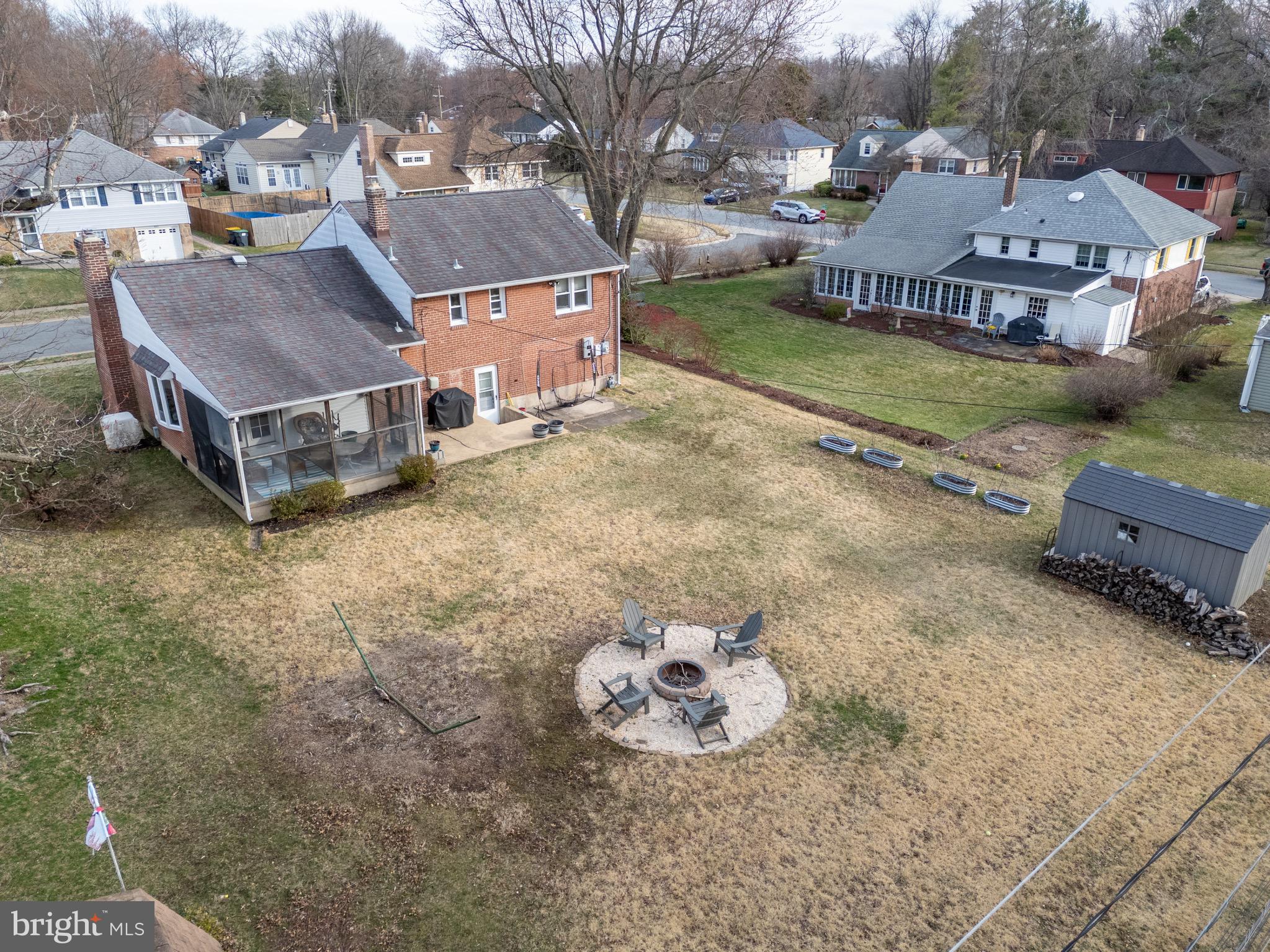 1003 Piper Road Wilmington, DE 19803 - Photo 33 of 40 an aerial view of a house with a yard basket ball court and outdoor seating