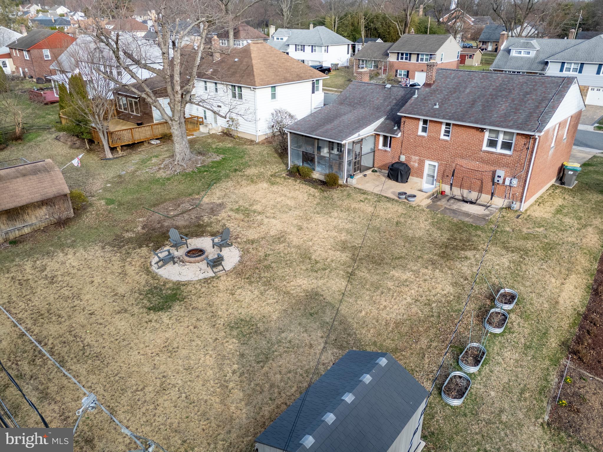 1003 Piper Road Wilmington, DE 19803 - Photo 34 of 40 an aerial view of a house with a yard and lake view