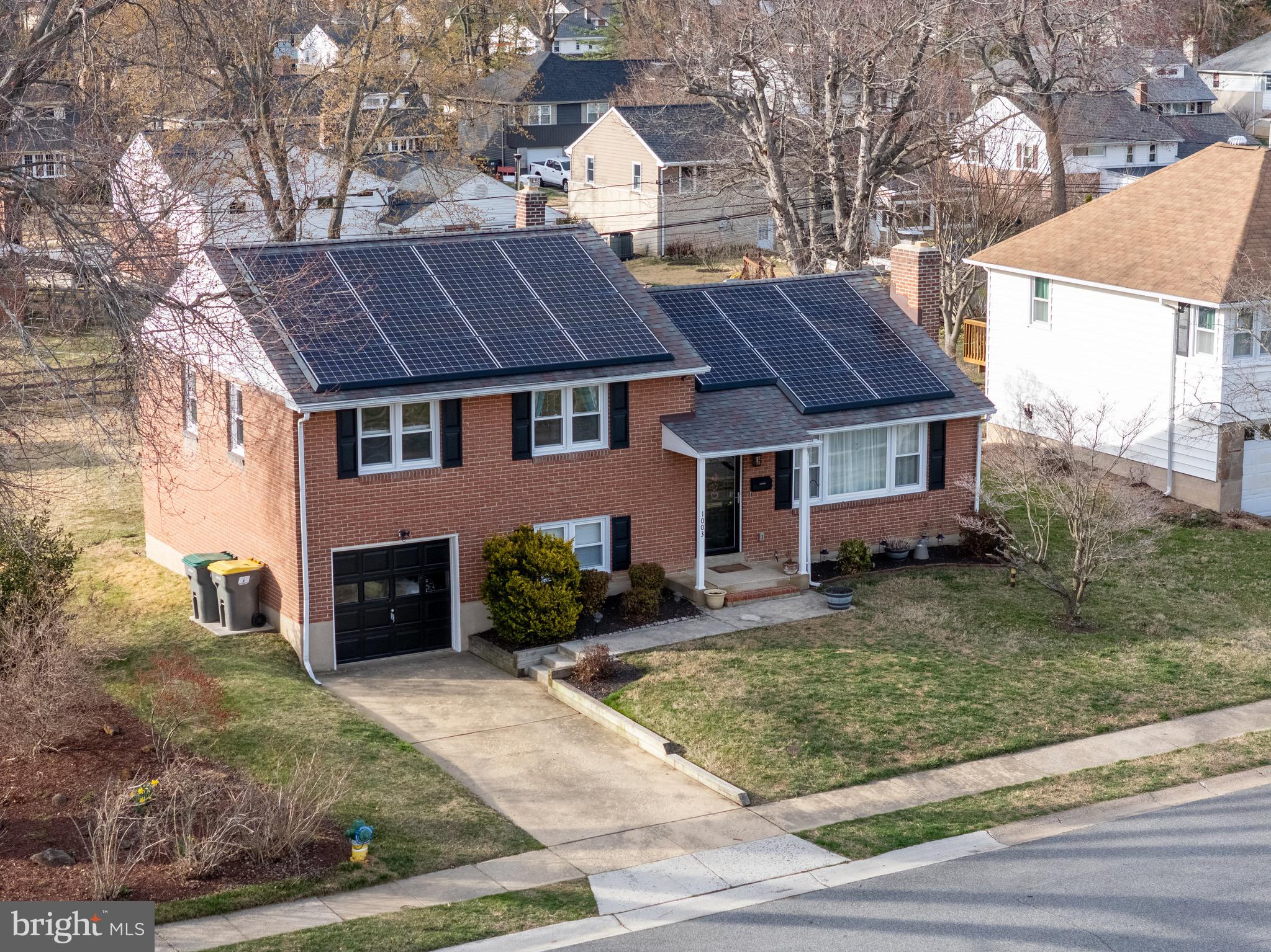 1003 Piper Road Wilmington, DE 19803 - Photo 40 of 40 a front view of a house with garden