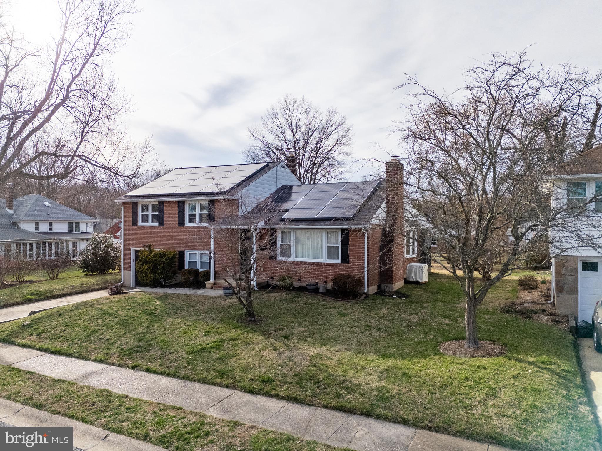 1003 Piper Road Wilmington, DE 19803 - Photo 4 of 40 front view of a house with a yard