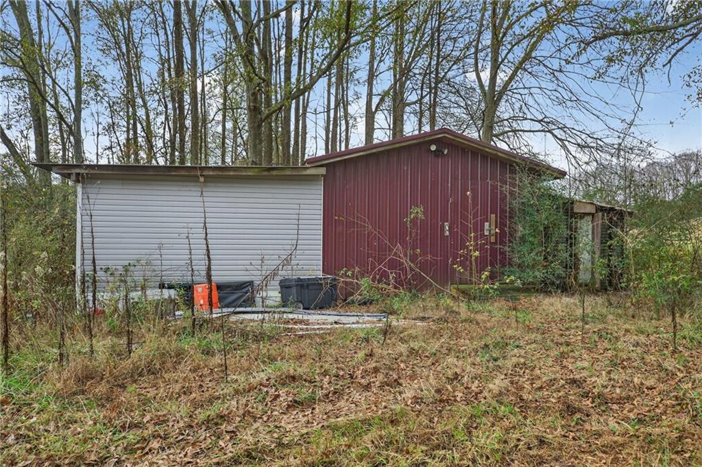 712 West 5th Highway Roopville, GA 30170 - Photo 23 of 29 a house view with a backyard space