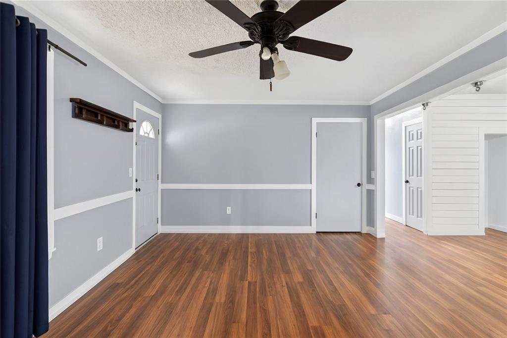 712 West 5th Highway Roopville, GA 30170 - Photo 5 of 29 wooden floor in an empty room