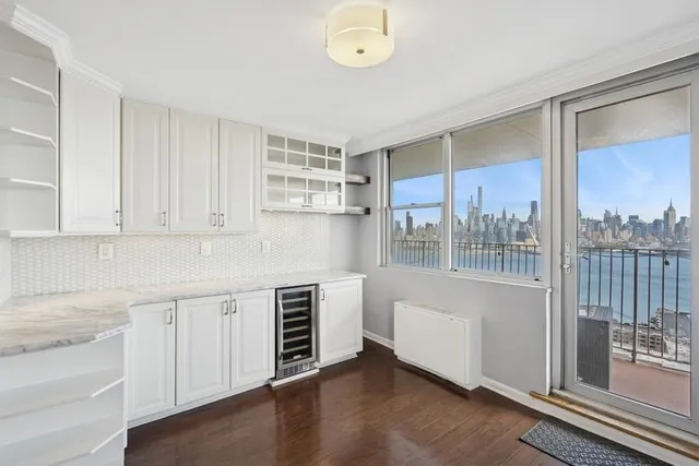 a view of cabinets and window