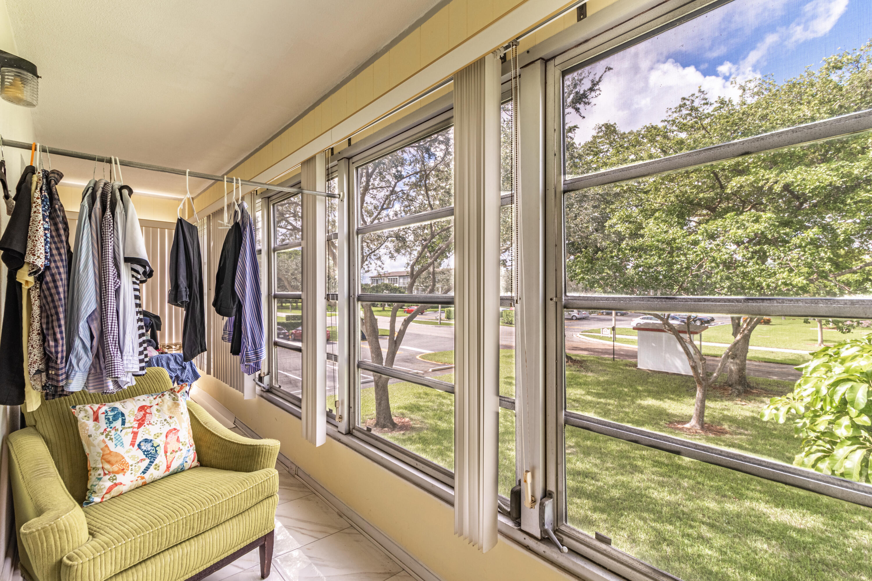 351 Mansfield I Boca Raton, FL 33434 - Photo 11 of 18 a living room with furniture and a large window