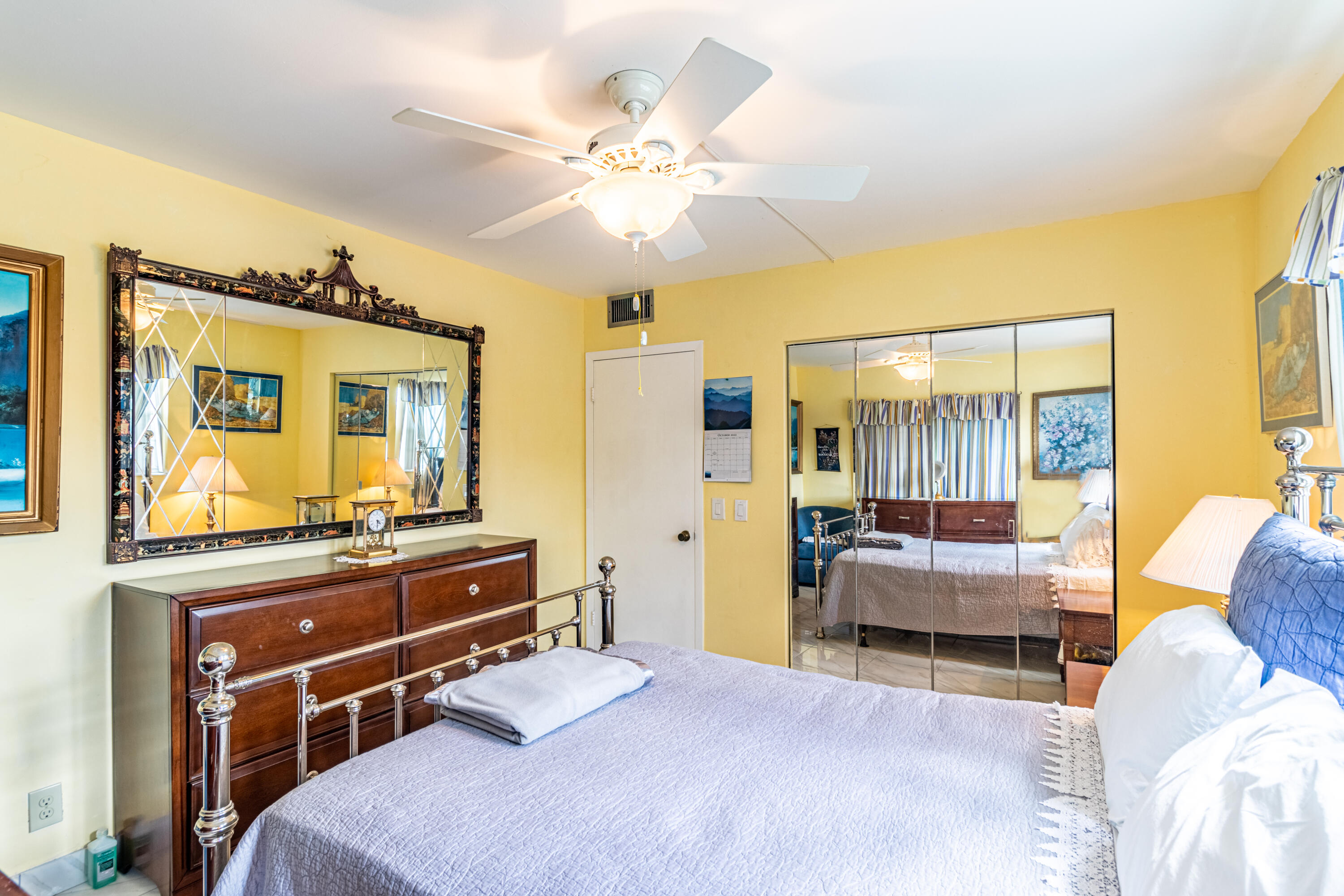 351 Mansfield I Boca Raton, FL 33434 - Photo 5 of 18 a bedroom with a bed and wooden floor