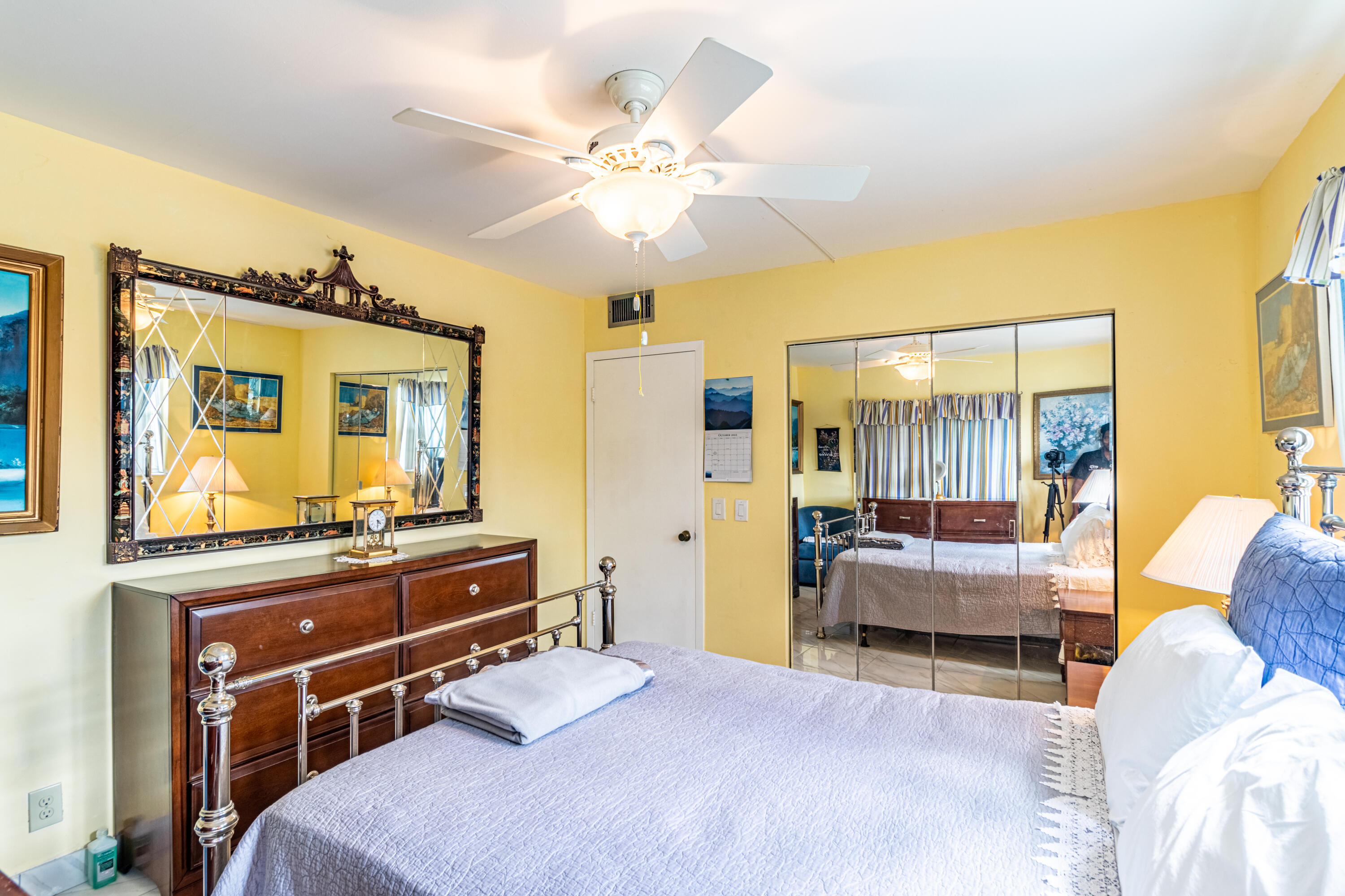 351 Mansfield I Boca Raton, FL 33434 - Photo 6 of 18 a bedroom with a bed and wooden floor