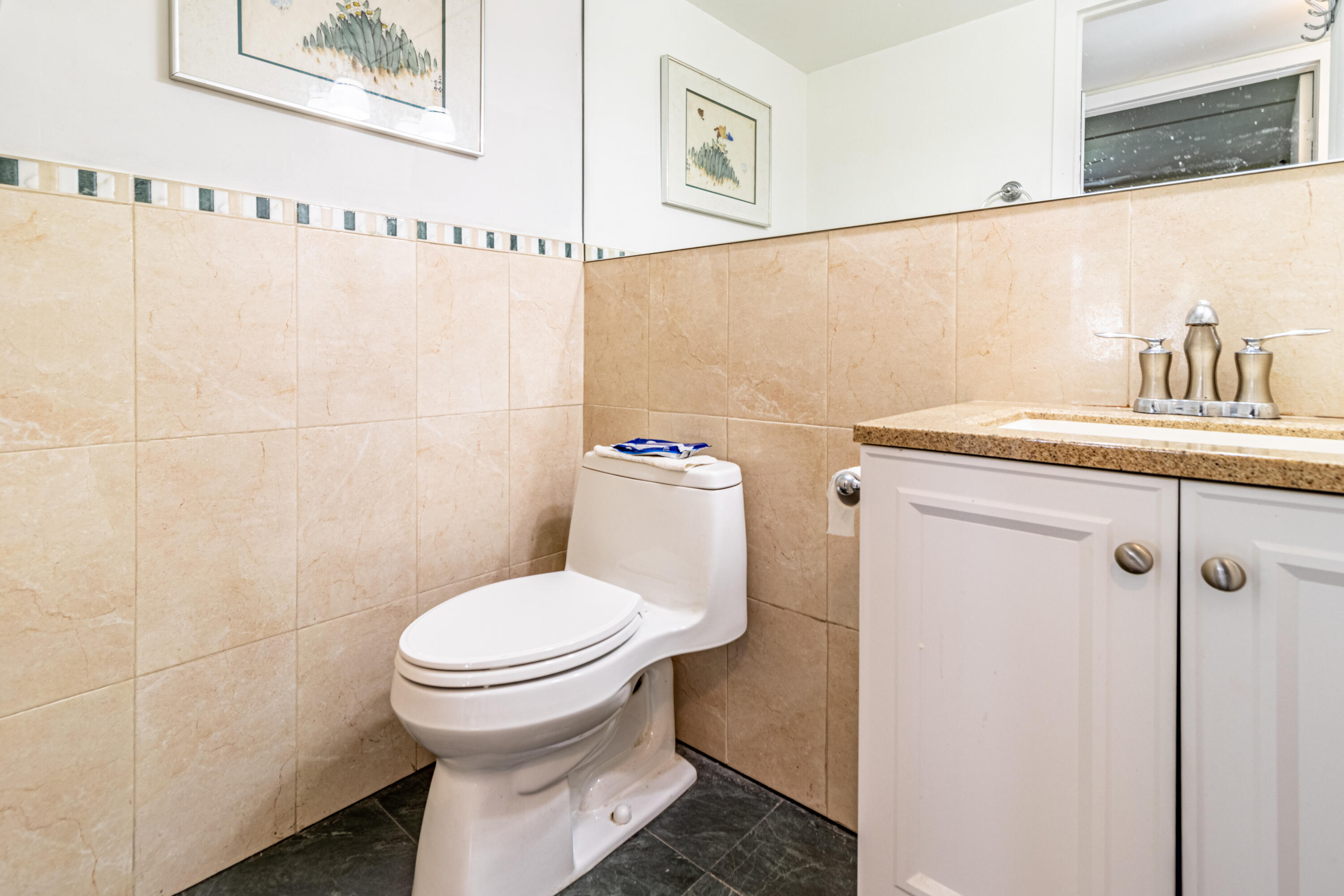 351 Mansfield I Boca Raton, FL 33434 - Photo 8 of 18 a bathroom with a toilet and a sink