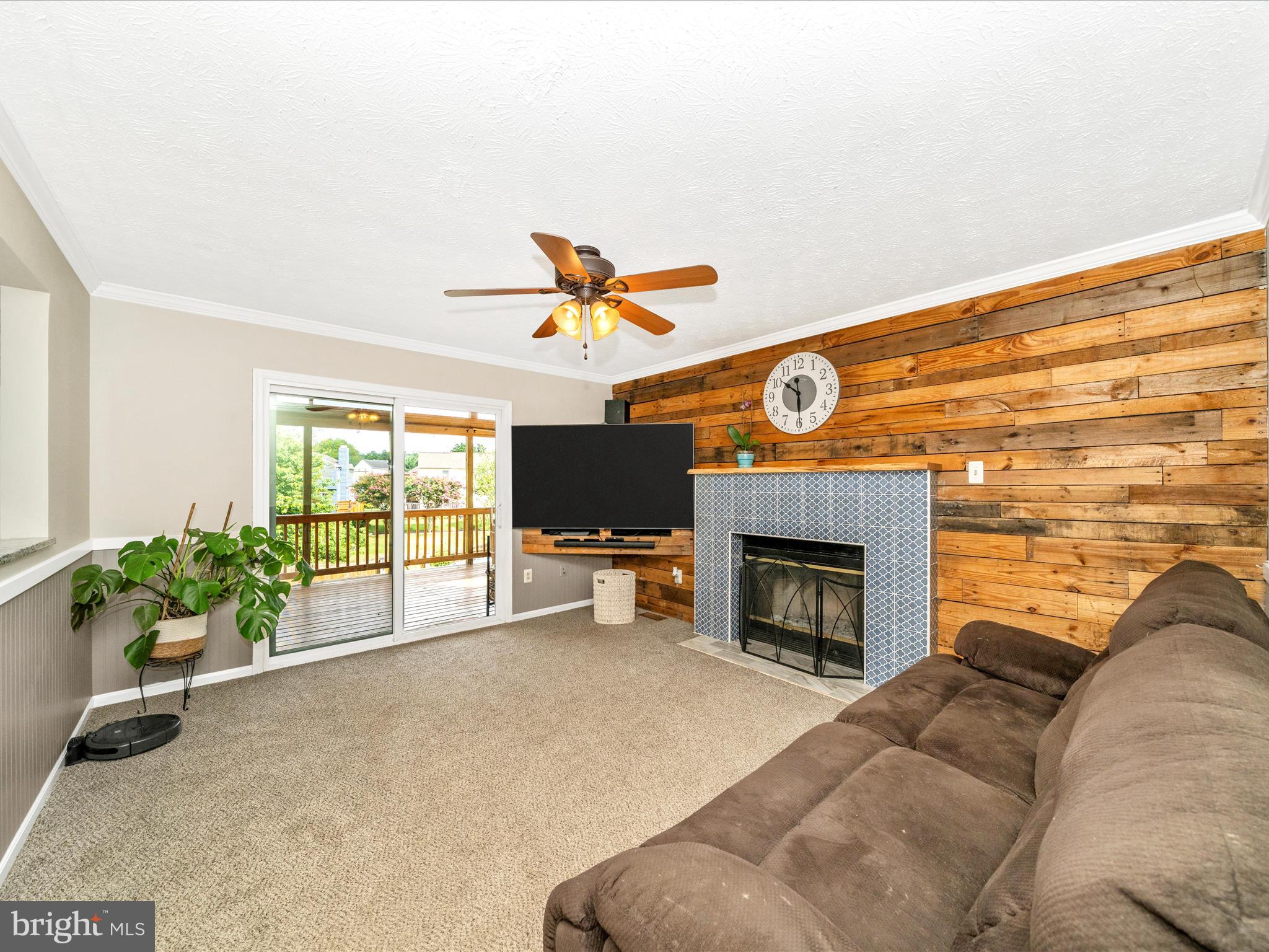 5004 Mallard Lane Frederick, MD 21703 - Photo 18 of 35 a living room with furniture and a fireplace