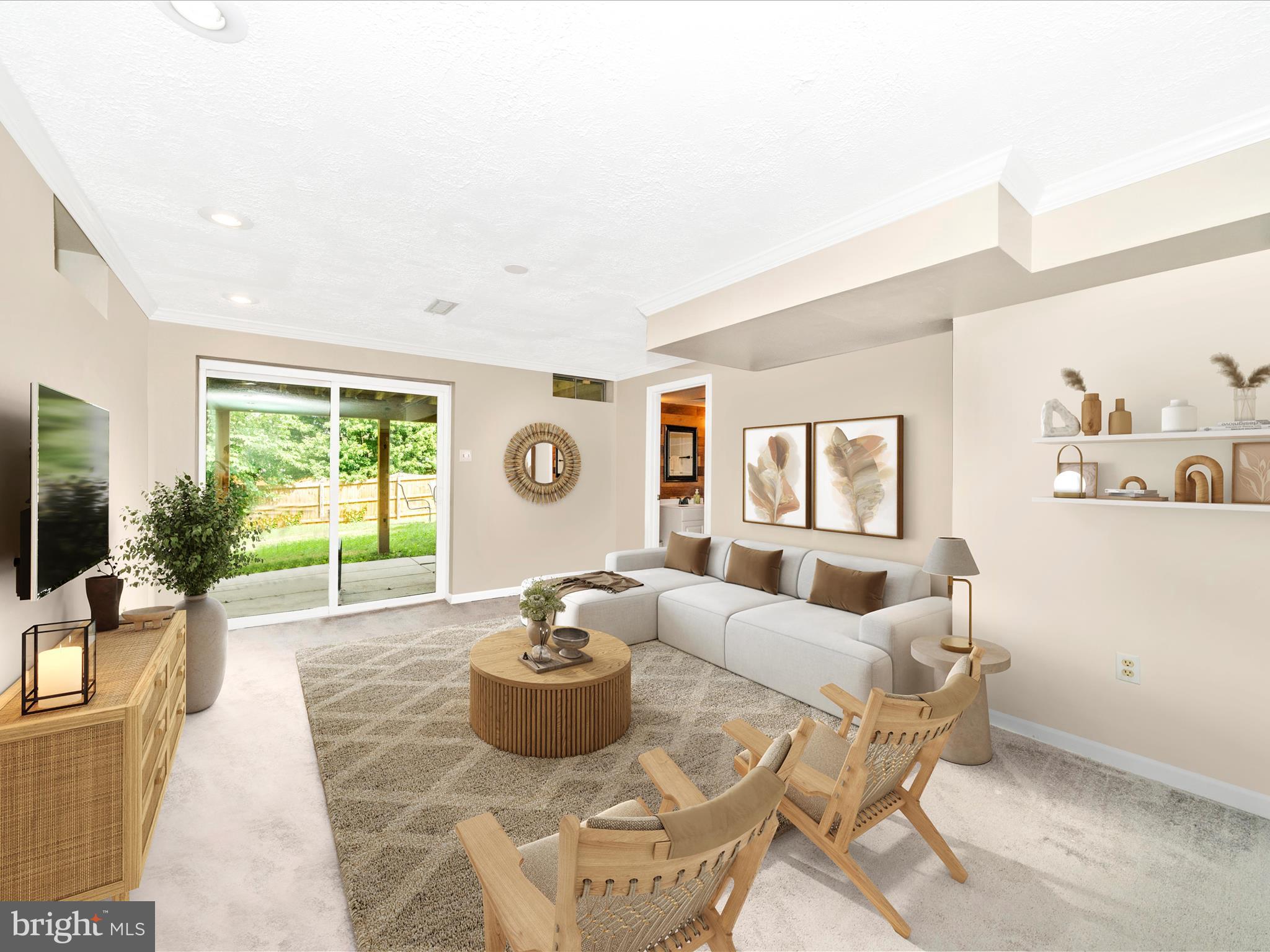 5004 Mallard Lane Frederick, MD 21703 - Photo 33 of 35 a living room with furniture and a flat screen tv