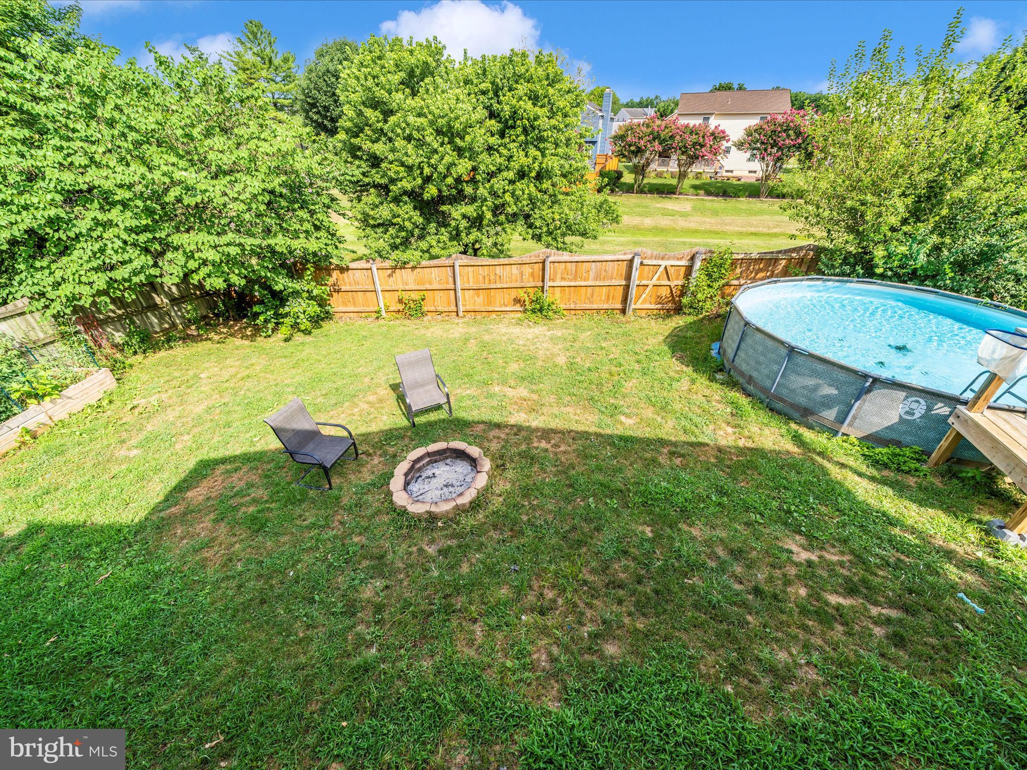 5004 Mallard Lane Frederick, MD 21703 - Photo 10 of 35 a view of a backyard with table and chairs