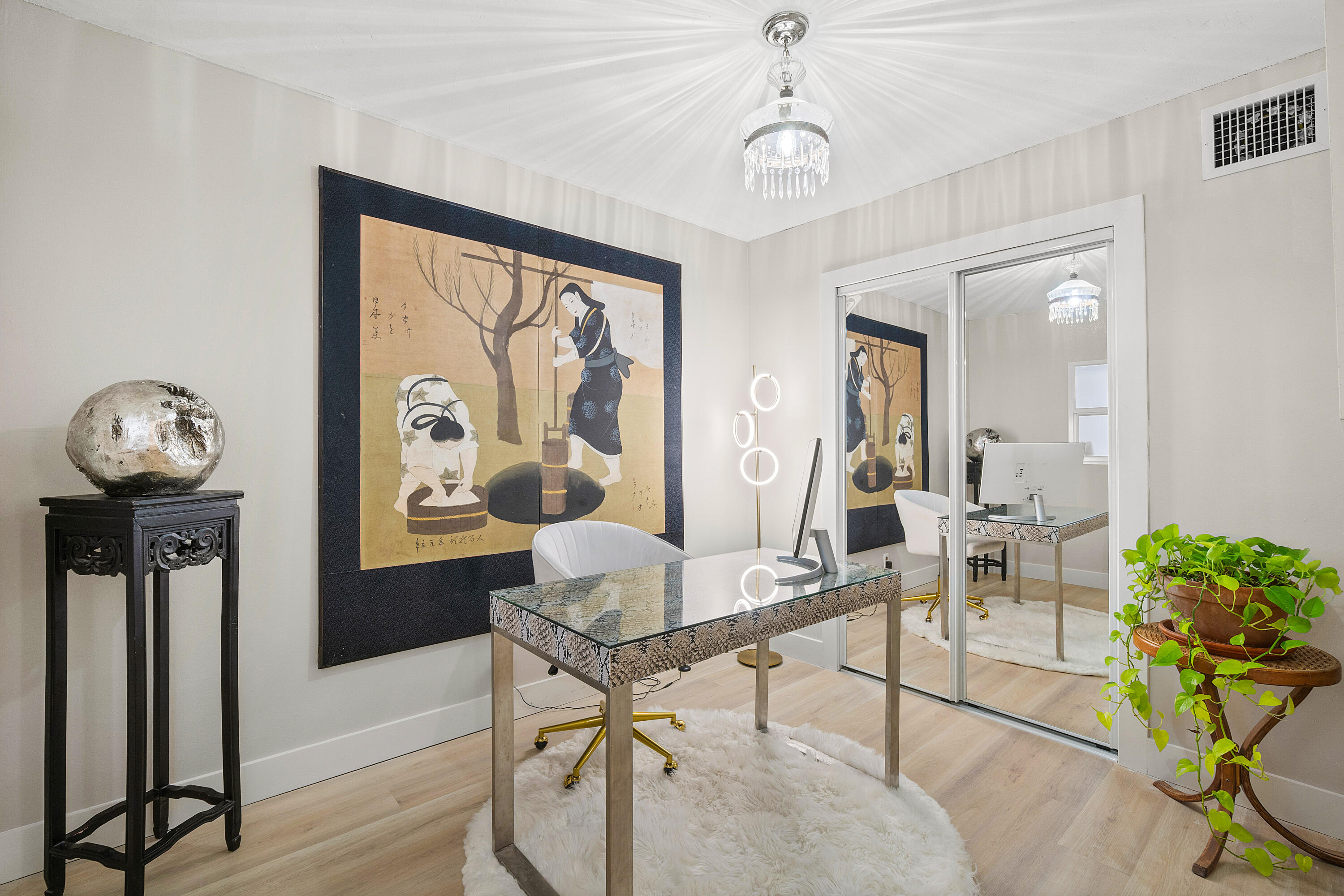 2805 Southwest 22nd Avenue, Unit 1040 Delray Beach, FL 33445 - Photo 5 of 18 a view of a dining room with furniture window and wooden floor