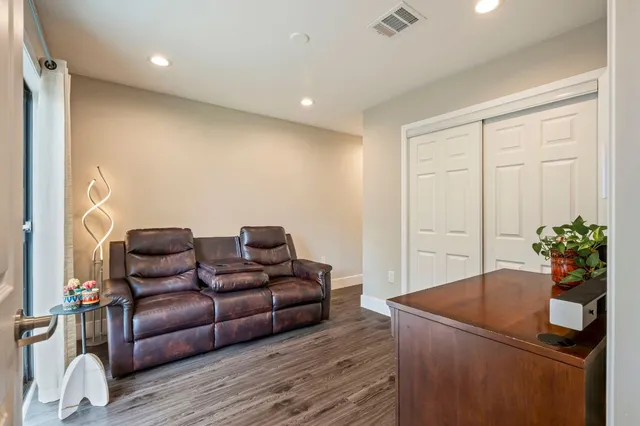 a view of a workspace with furniture