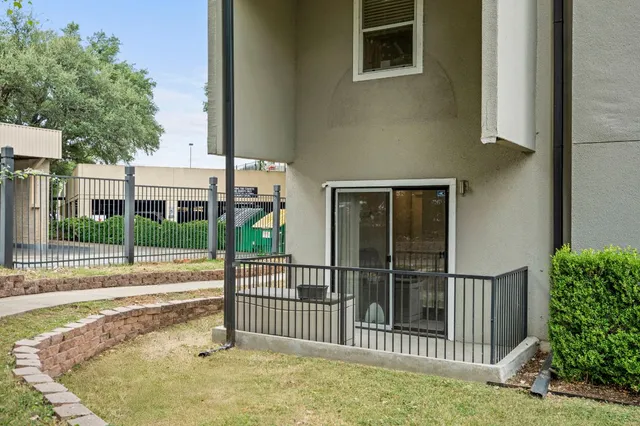 a view of storage and utility room with a window