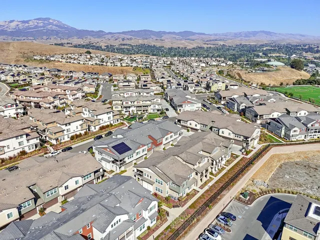 an aerial view of residential house with an outdoor space