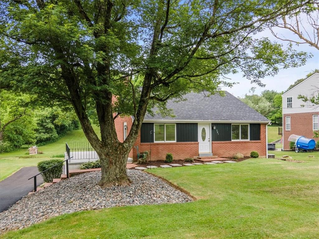 301 McCombs Road Venetia, PA 15367 - Photo 1 of 37 a view of a house with backyard and sitting area