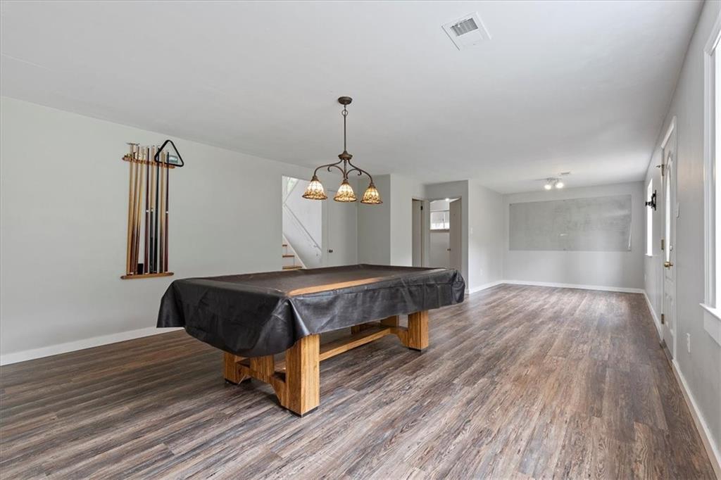 301 McCombs Road Venetia, PA 15367 - Photo 24 of 37 a spacious bedroom with a bed and wooden floor