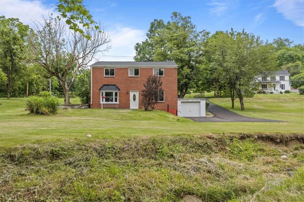 301 McCombs Road Venetia, PA 15367 - Photo 3 of 37 a view of a house with a yard