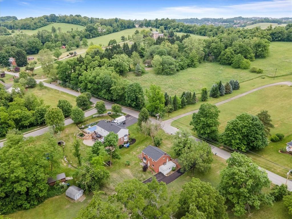 301 McCombs Road Venetia, PA 15367 - Photo 35 of 37 an aerial view of green landscape with trees houses and mountain view