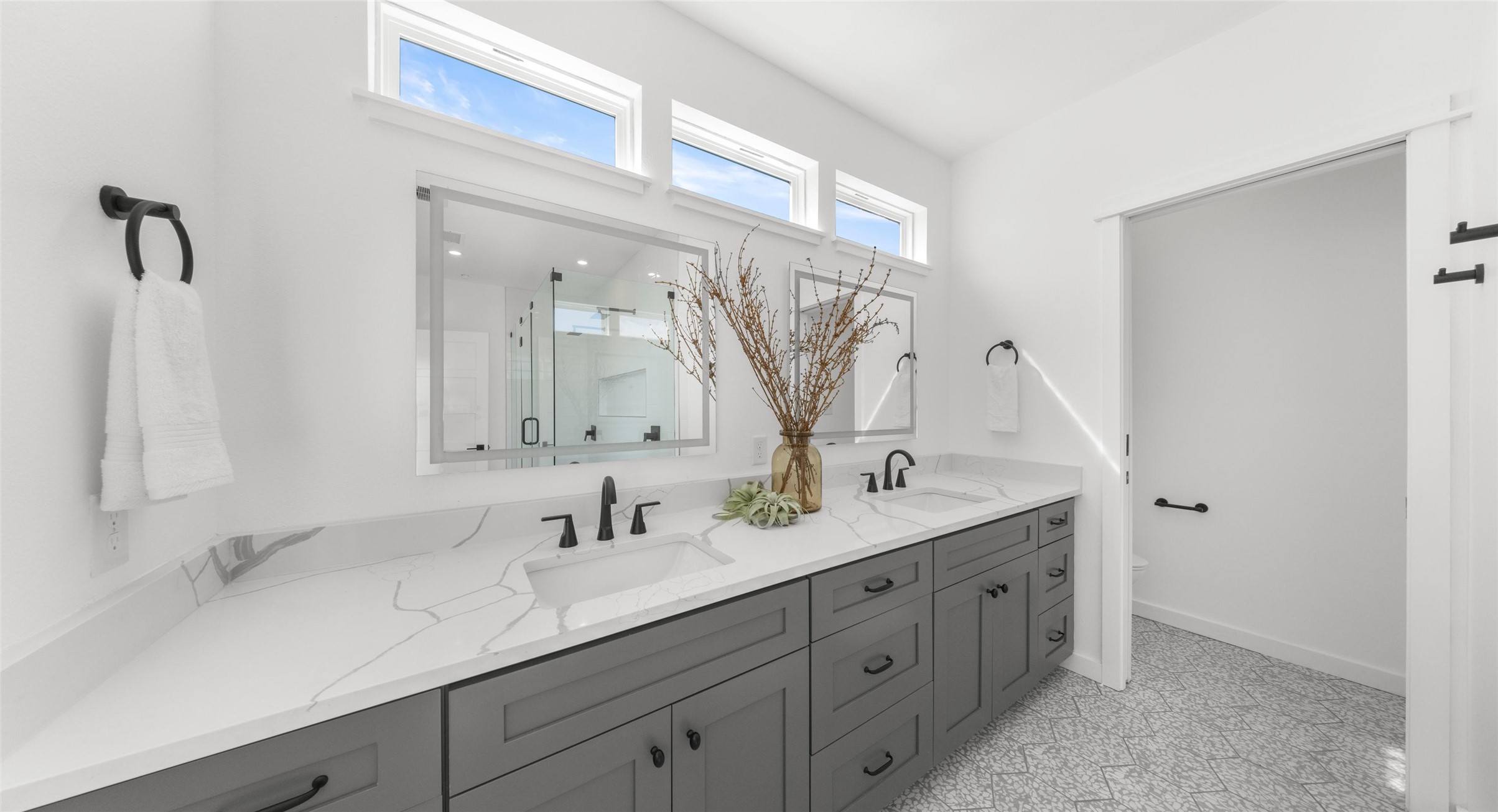 5912 Harold Court, Unit 107 Austin, TX 78721 - Photo 25 of 35 A double vanity offers room to spread out, turning the morning routine into something calmer. Model No. 105 Shown.
