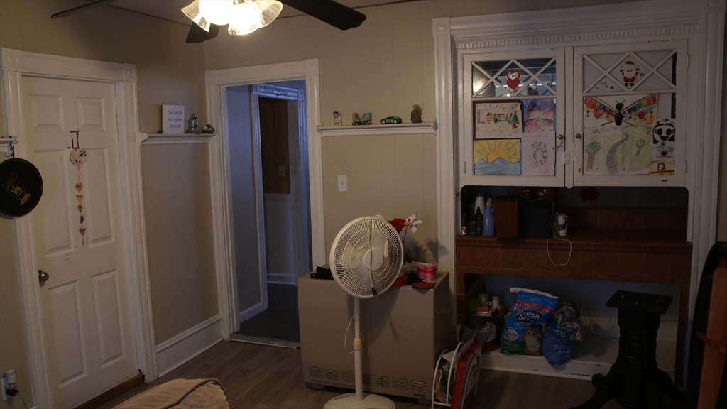 1951 Pleasant Street Fall River, MA 02723 - Photo 18 of 24 a room with a walk in closet and wooden floor