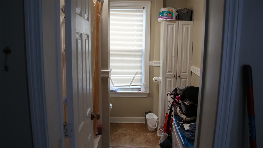 1951 Pleasant Street Fall River, MA 02723 - Photo 19 of 24 a view of a closet with storage