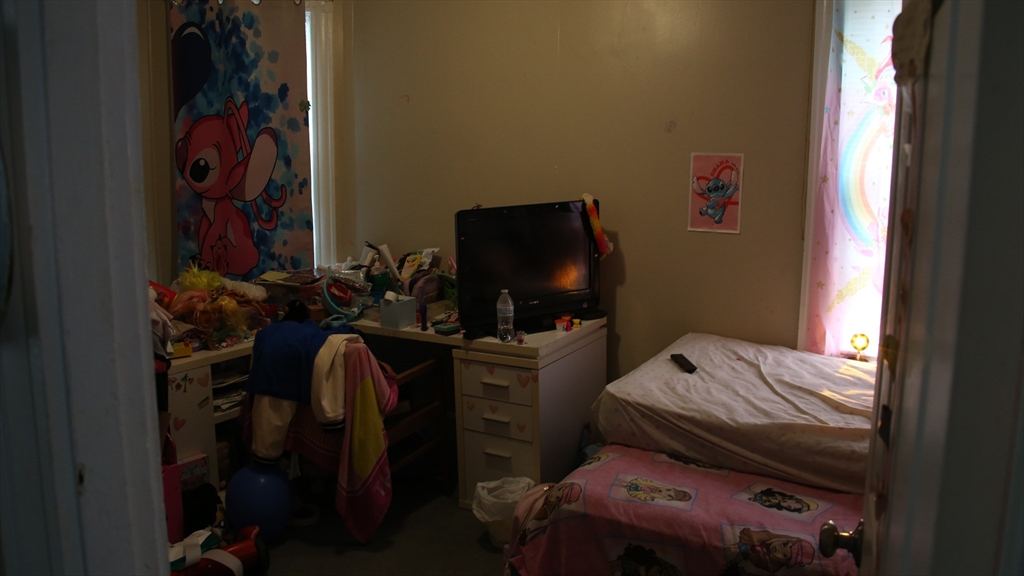1951 Pleasant Street Fall River, MA 02723 - Photo 23 of 24 a bedroom with a bed and a tv