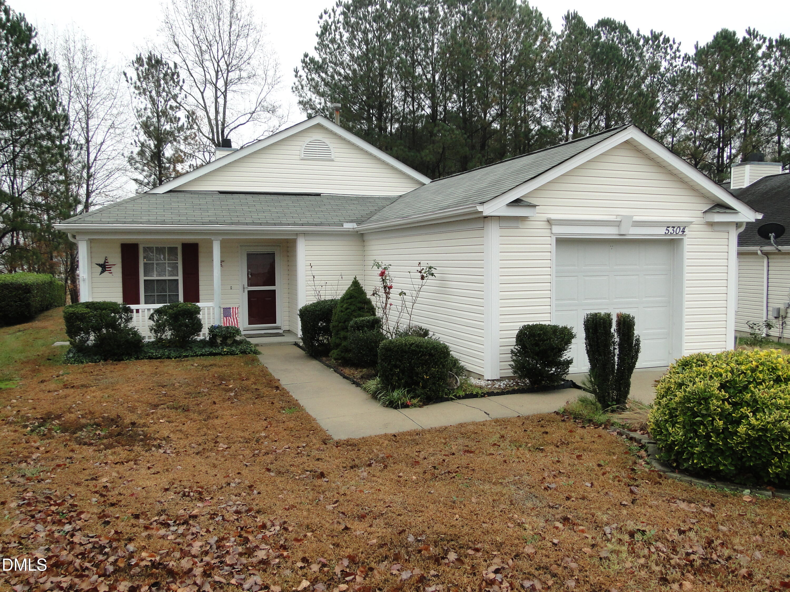 5304 Marthonna Way Raleigh, NC 27616 - Photo 1 of 19 a front view of house with yard and trees in the background