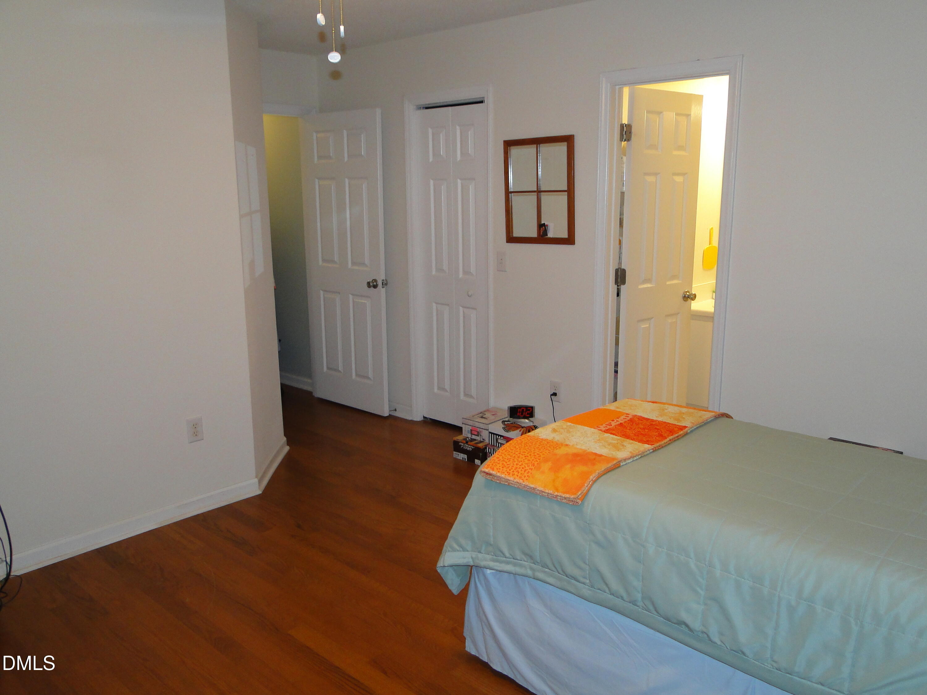 5304 Marthonna Way Raleigh, NC 27616 - Photo 11 of 19 a bedroom with a bed and a window