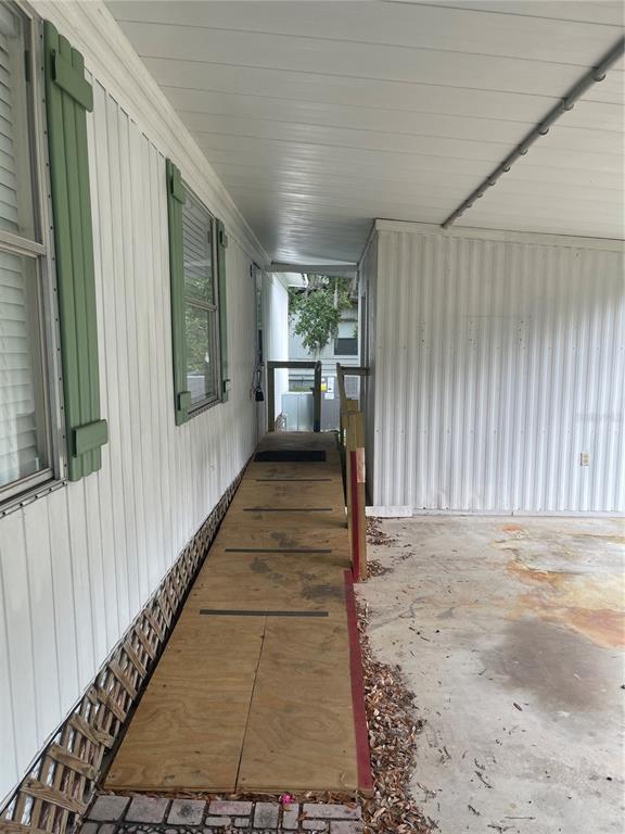 25225 Northeast 139th Street Salt Springs, FL 32134 - Photo 3 of 14 a view of a porch