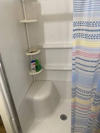 25225 Northeast 139th Street Salt Springs, FL 32134 - Photo 6 of 14 a bathroom with a bathtub and a shower