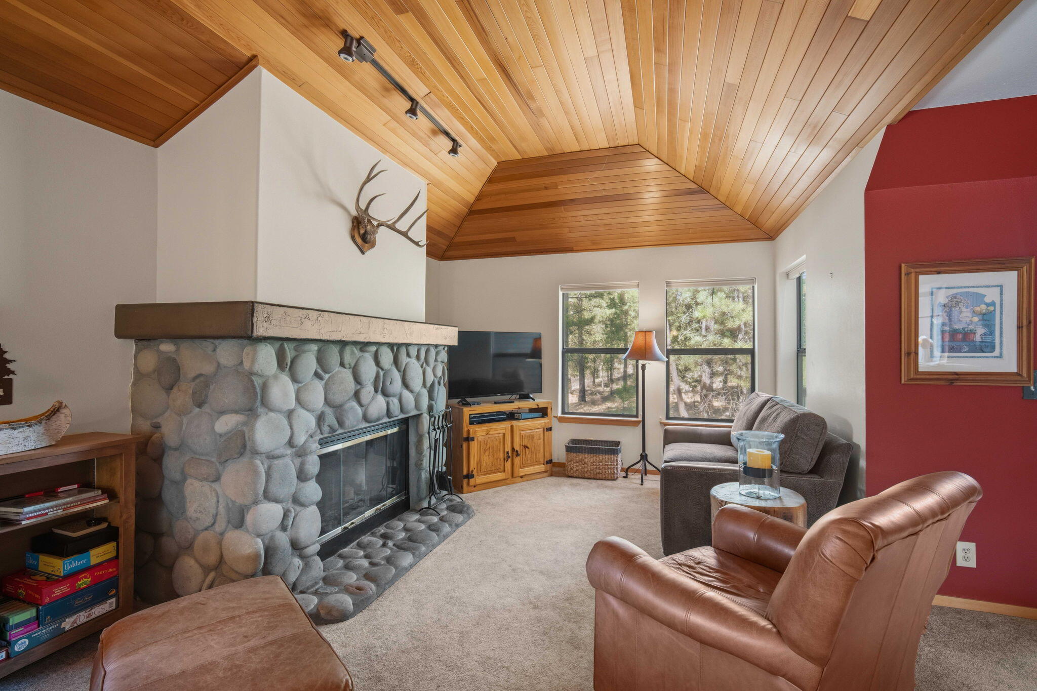 17682 Bittern Lane, Unit 31 Sunriver, OR 97707 - Photo 18 of 44 a living room with furniture and a fireplace