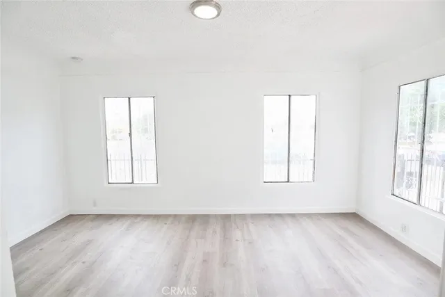 a bathroom with a toilet and a bathtub