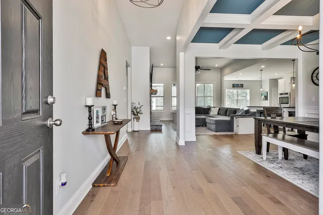 a view of a living room and a dining room