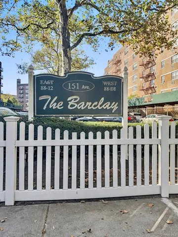 a view of a wooden fence