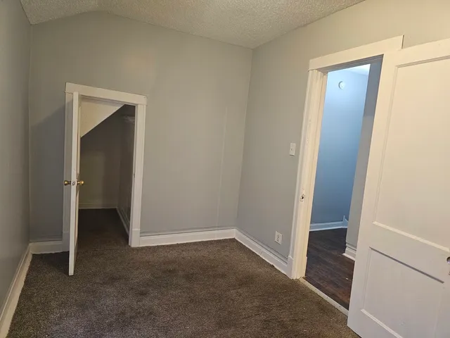 an empty room that has a window