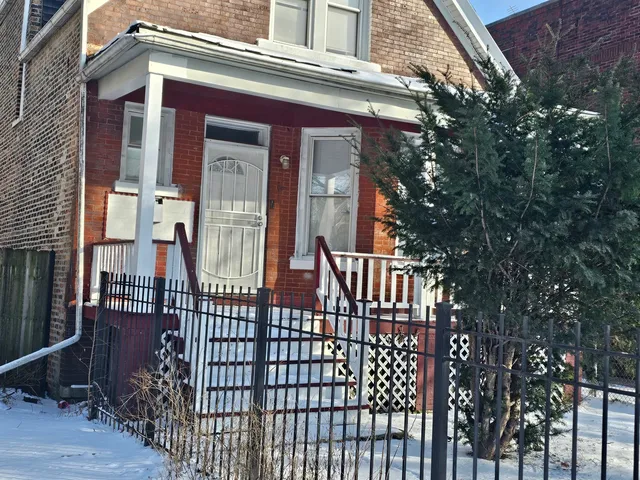 a bathroom with a toilet a sink and a mirror