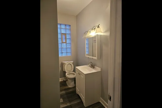 a bathroom with a sink mirror bathtub and shower