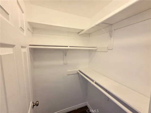 a view of a room with racks on the wall