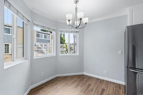 a view of room with window and hallway