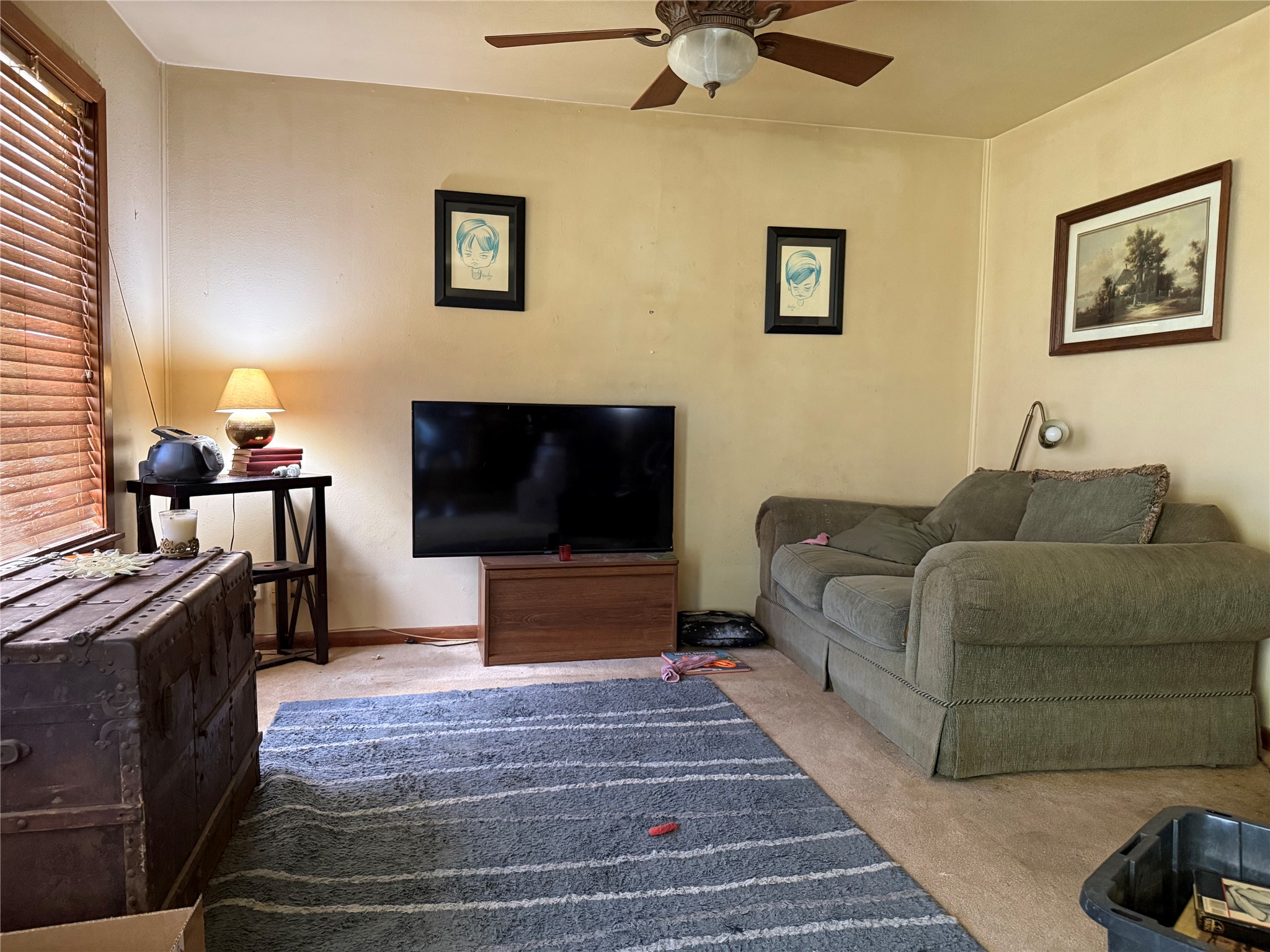2607 Lilac Street Pasadena, TX 77503 - Photo 3 of 12 a living room with furniture and a flat screen tv