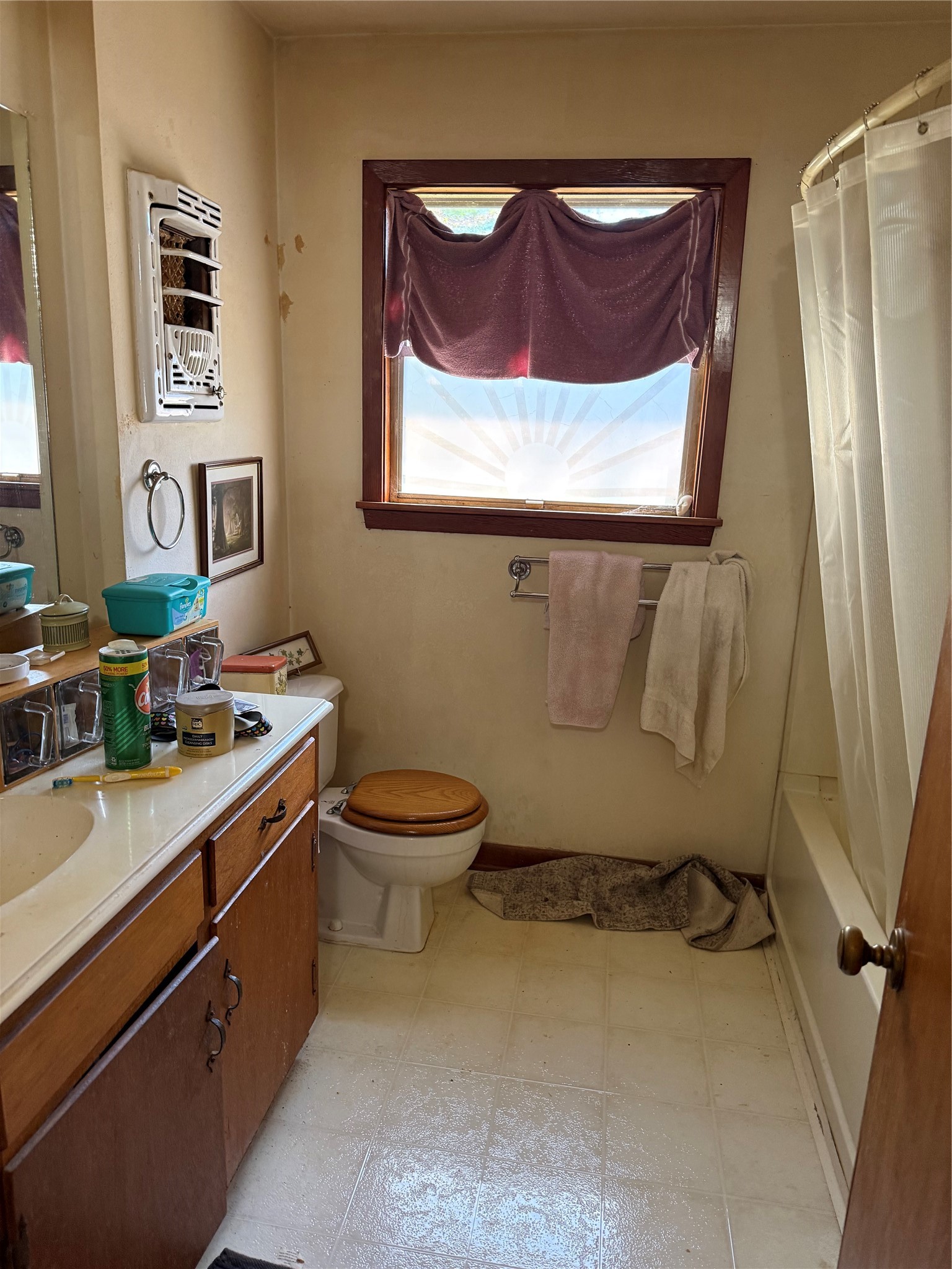 2607 Lilac Street Pasadena, TX 77503 - Photo 7 of 12 a bathroom with a sink mirror vanity and toilet