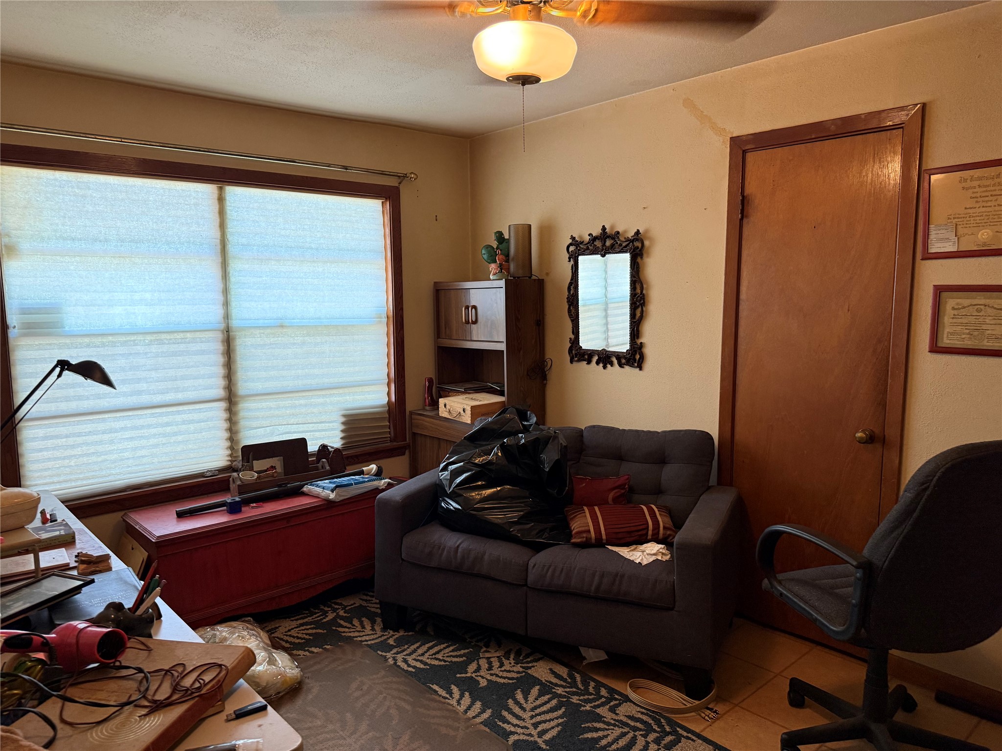 2607 Lilac Street Pasadena, TX 77503 - Photo 8 of 12 a living room with furniture and a window