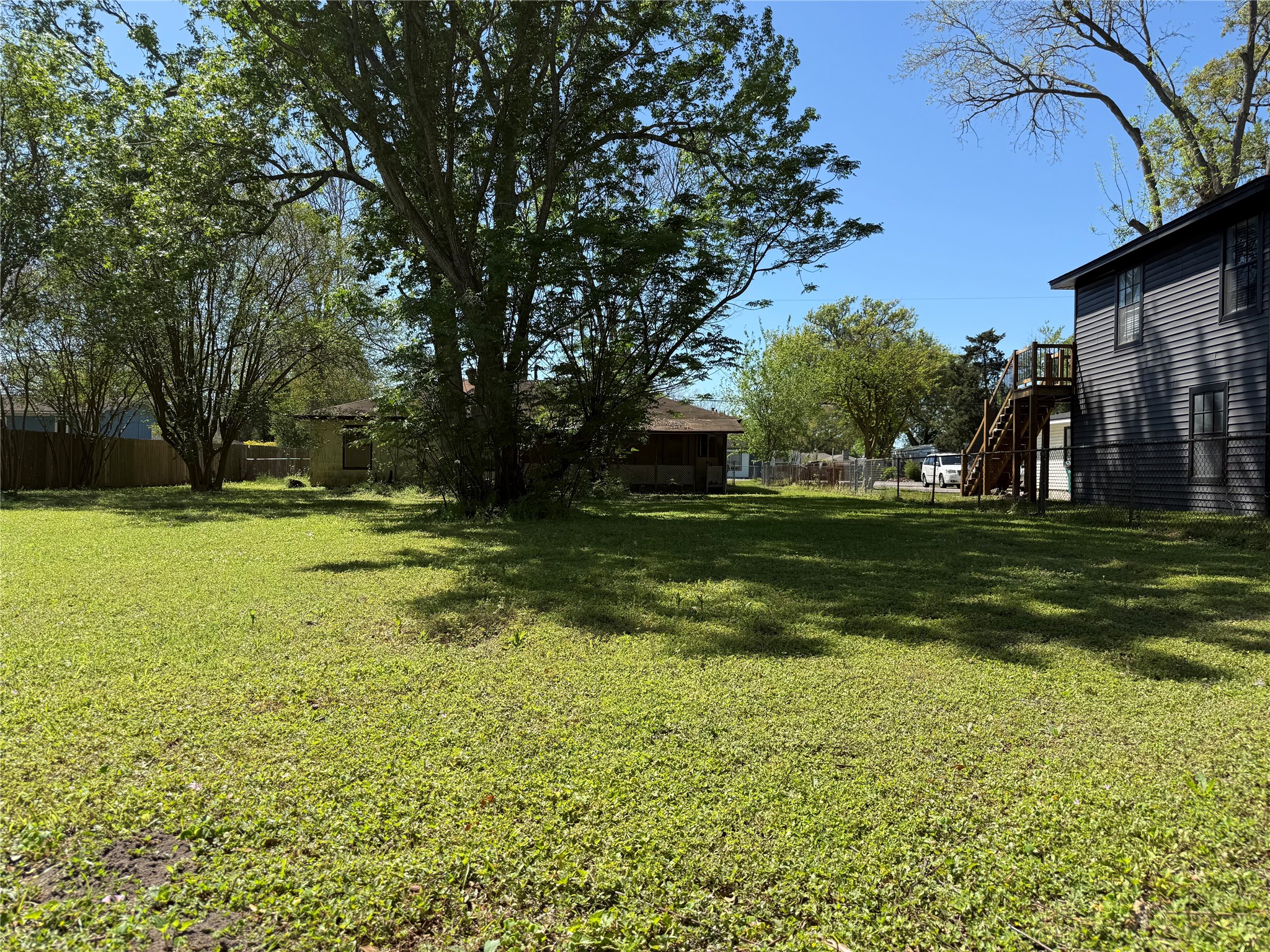 2607 Lilac Street Pasadena, TX 77503 - Photo 9 of 12 a view of a park with large trees