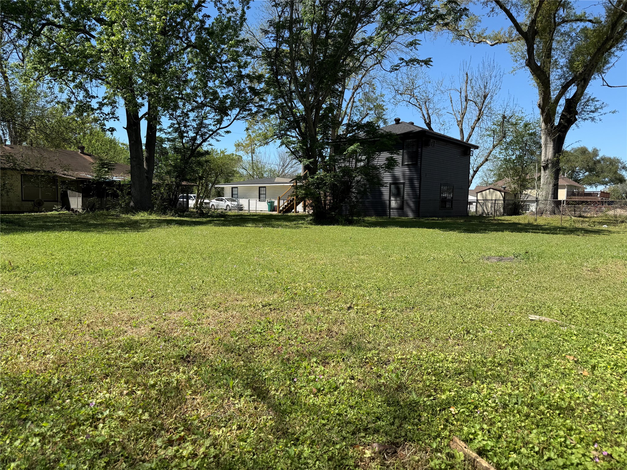 2607 Lilac Street Pasadena, TX 77503 - Photo 10 of 12 a view of a house with a yard