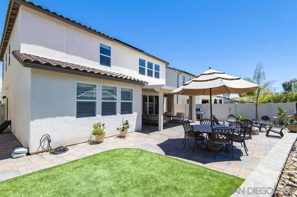 8828 Weston Road Santee, CA 92071 - Photo 12 of 25 a view of a house with backyard sitting area and garden