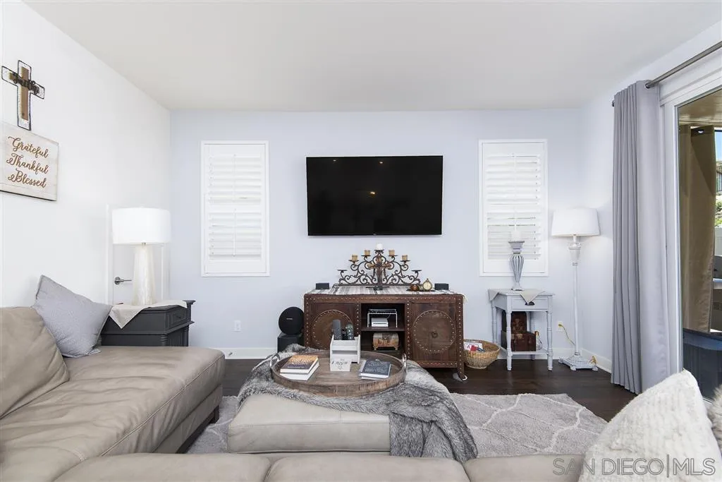 8828 Weston Road Santee, CA 92071 - Photo 14 of 25 a living room with furniture and a flat screen tv