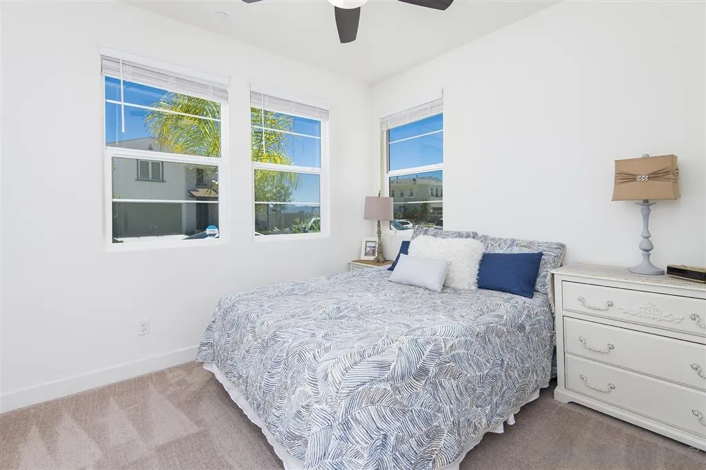 8828 Weston Road Santee, CA 92071 - Photo 15 of 25 a bedroom with a large bed and a window