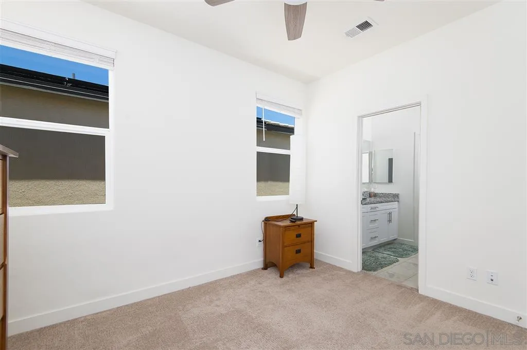 8828 Weston Road Santee, CA 92071 - Photo 20 of 25 an empty room with windows