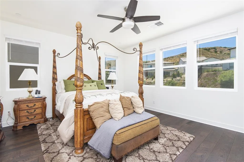 8828 Weston Road Santee, CA 92071 - Photo 22 of 25 a living room with furniture and a window